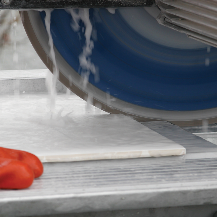 Using a Wet Tile Saw to Produce Precise, Clean Cuts on Glazed, Vitrified, and Glass Tiles