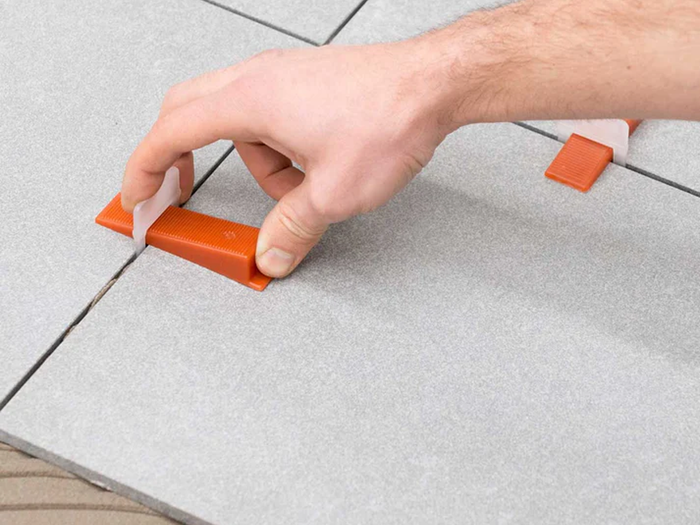Tile Leveling Systems Comparison: Spin Doctor vs. Wedge-Style (Which Saves More Time?)