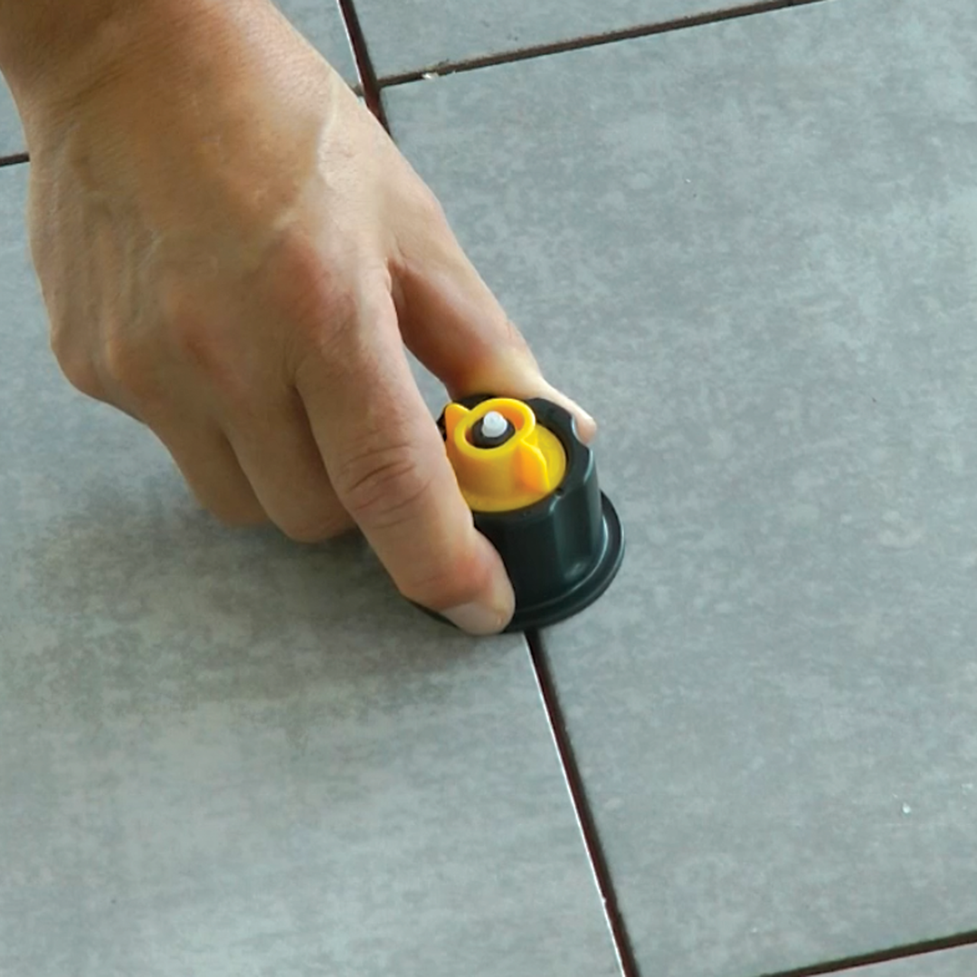 Alpha Professional Tools EZ Click Tile Leveling System Cap Installed