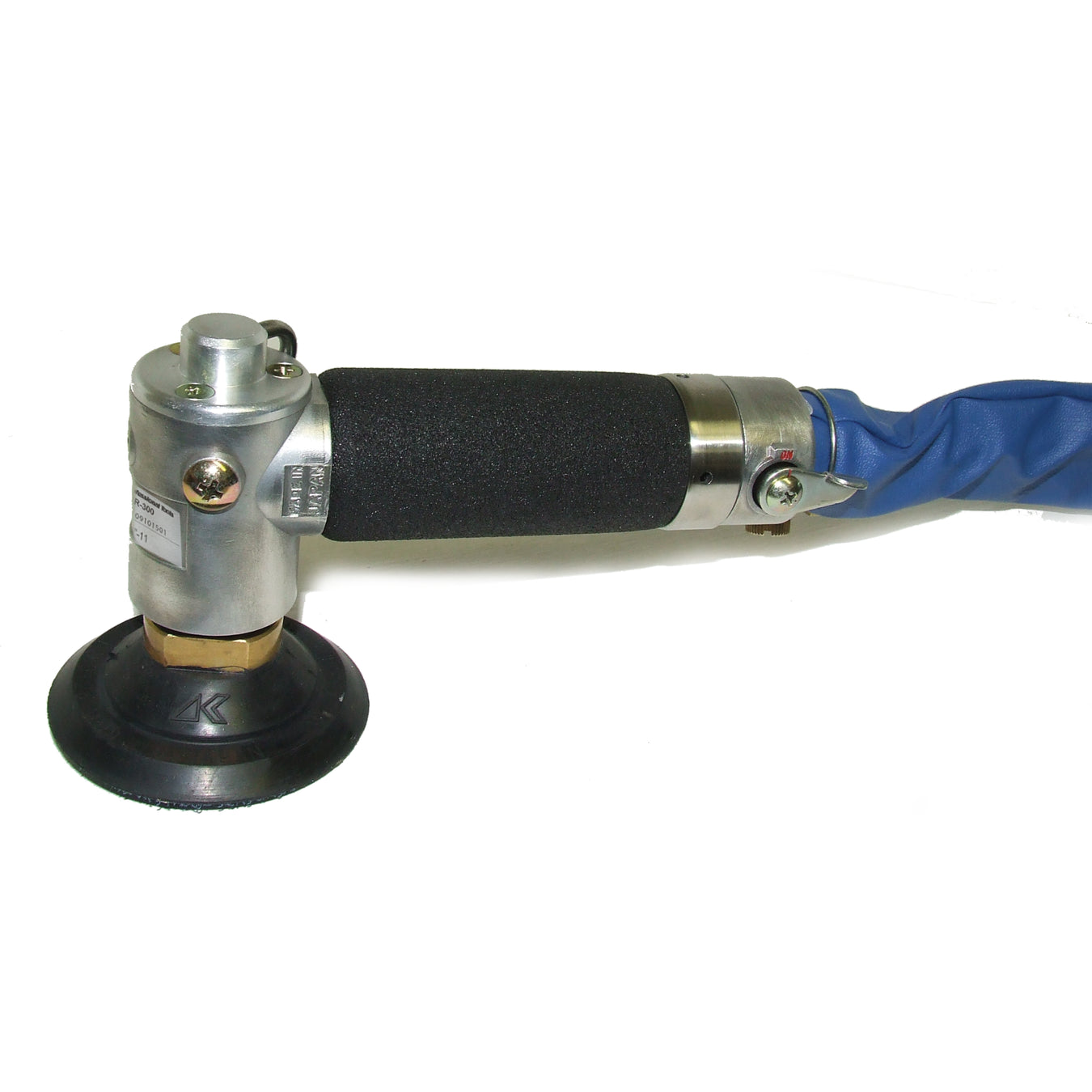 alpha mini air polisher with black handle and blue accents on a white background