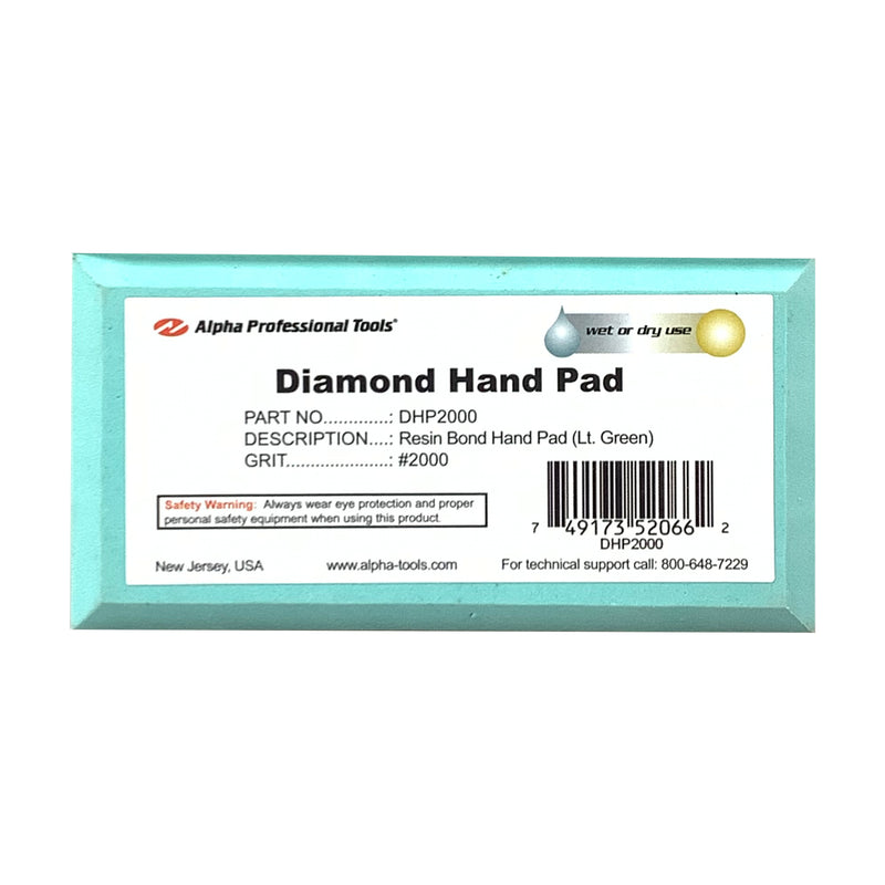 Alpha light green 2000 grit diamond hand pad on a white background