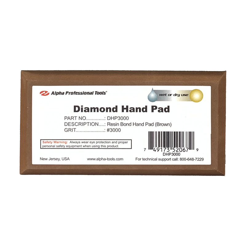 Alpha brown 3000 grit diamond hand pad on a white background
