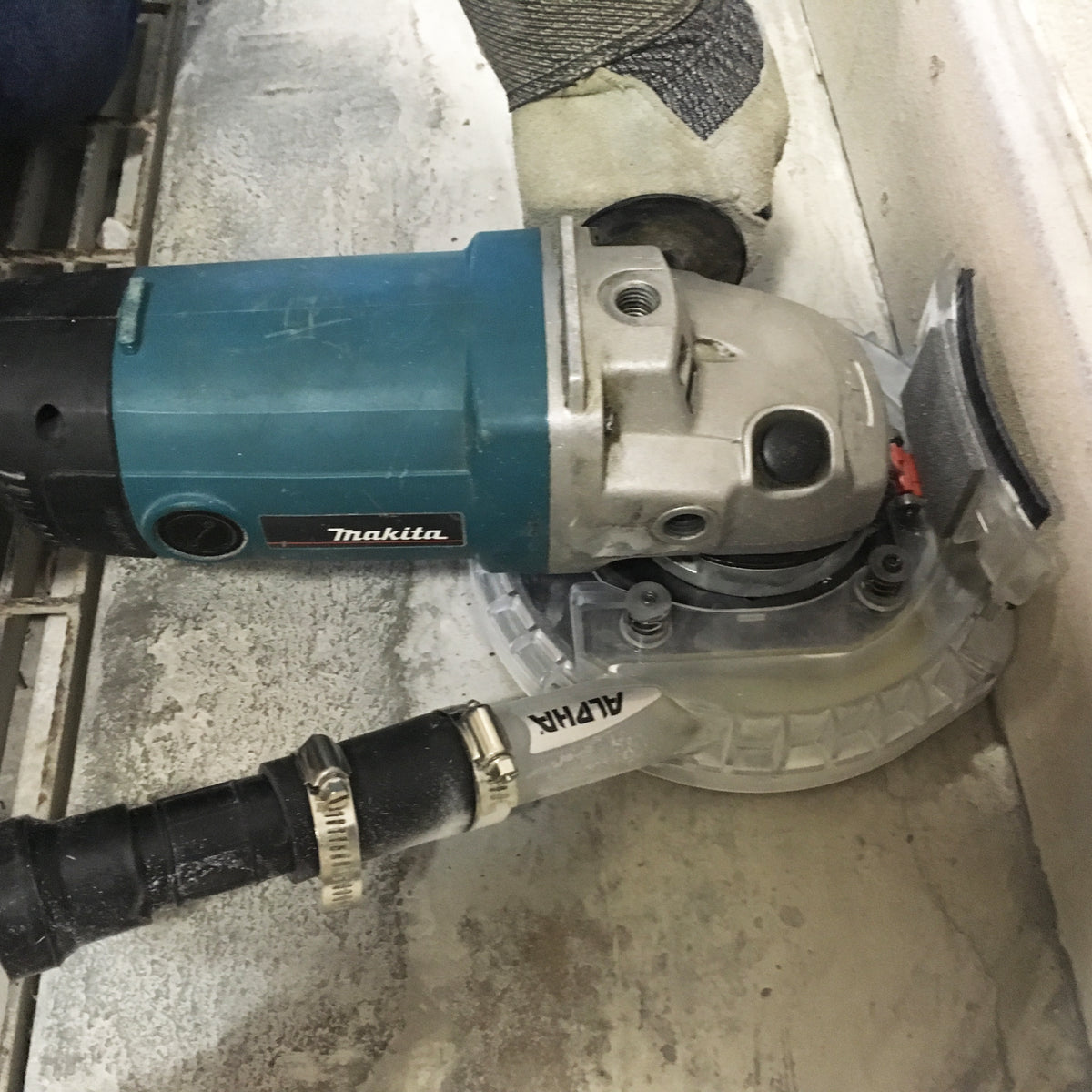 Alpha ecoguard g7 dust collection cover with open front butt against a wall