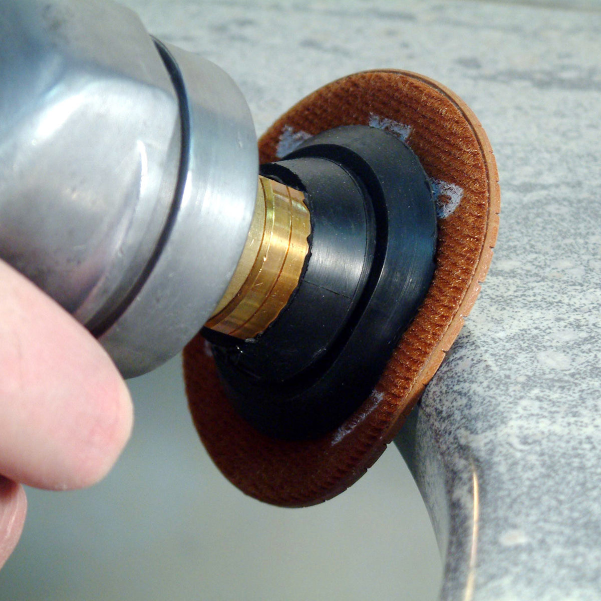 Alpha flexible backer pad with polishing pad attached polishing stone edge