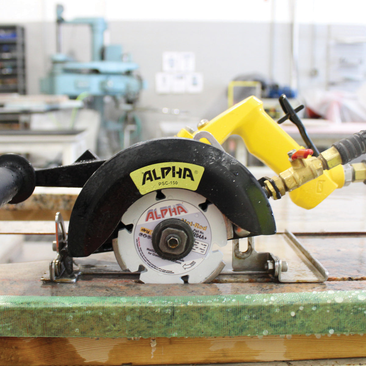 Still Shot of the Alpha psc-150 pneumatic stone cutter channel cutting 