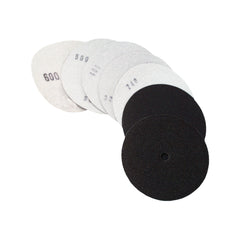 Set of Alpha sandpaper discs with different grits on a white background