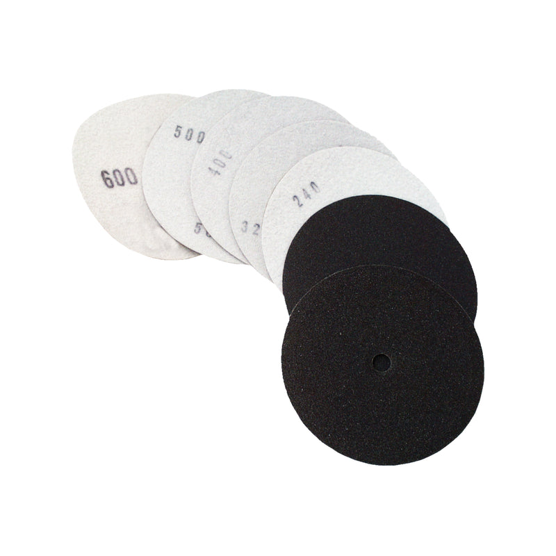 Set of Alpha sandpaper discs with different grits on a white background