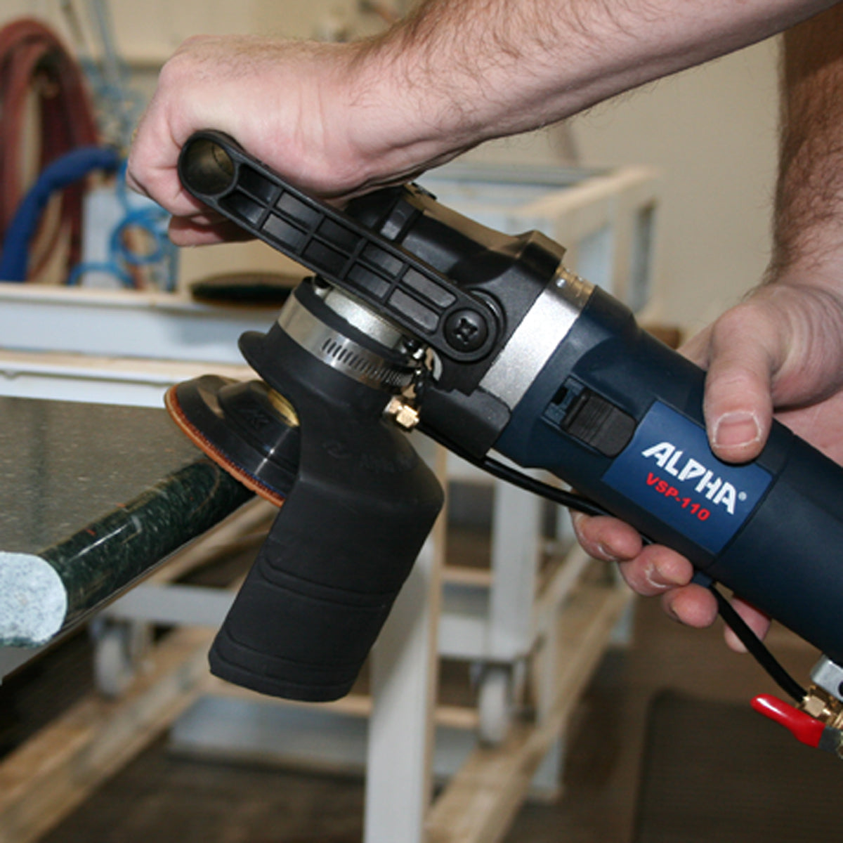 Person  using an Alpha VSP-110 Polisher and Ceramica EX Polishing pad  to polish bullnose edge