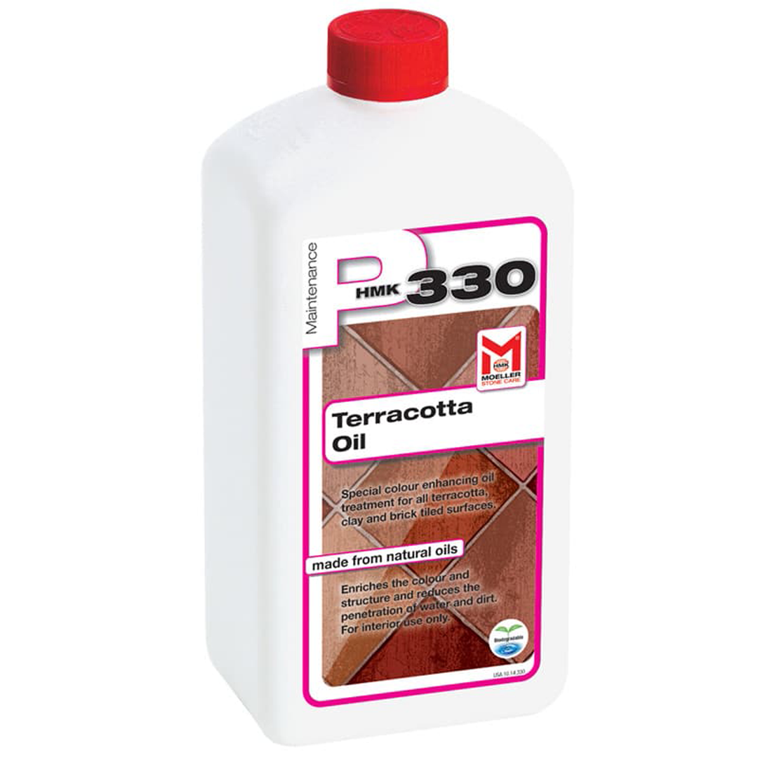 HMK P330 Terracotta Oil bottle on a clean terracotta tile surface