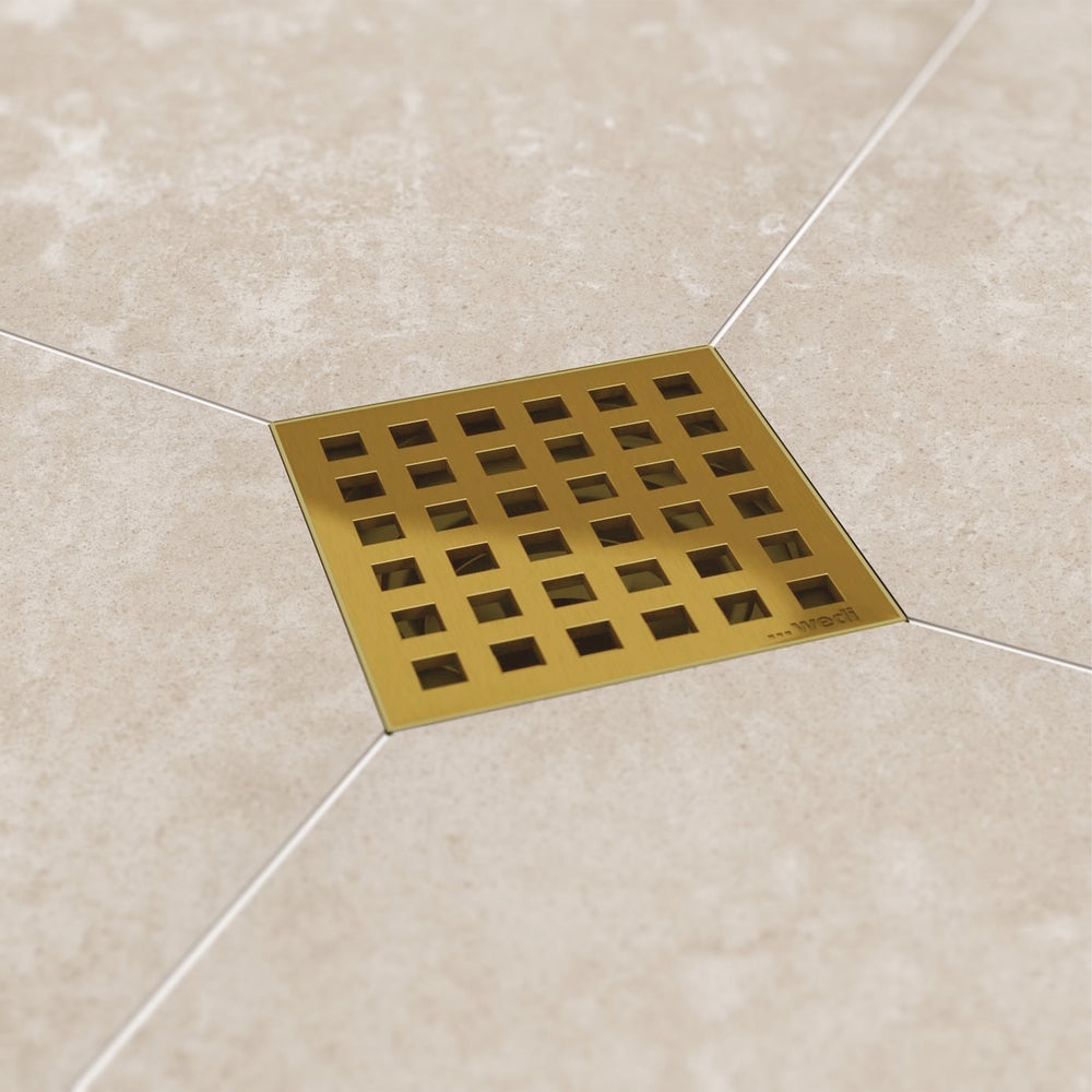 Wedi Gold Drain Cover with Tan Tile