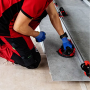 Attaching RUBI Ergonomic Large Format Tile Transport System to Porcelain Sheet