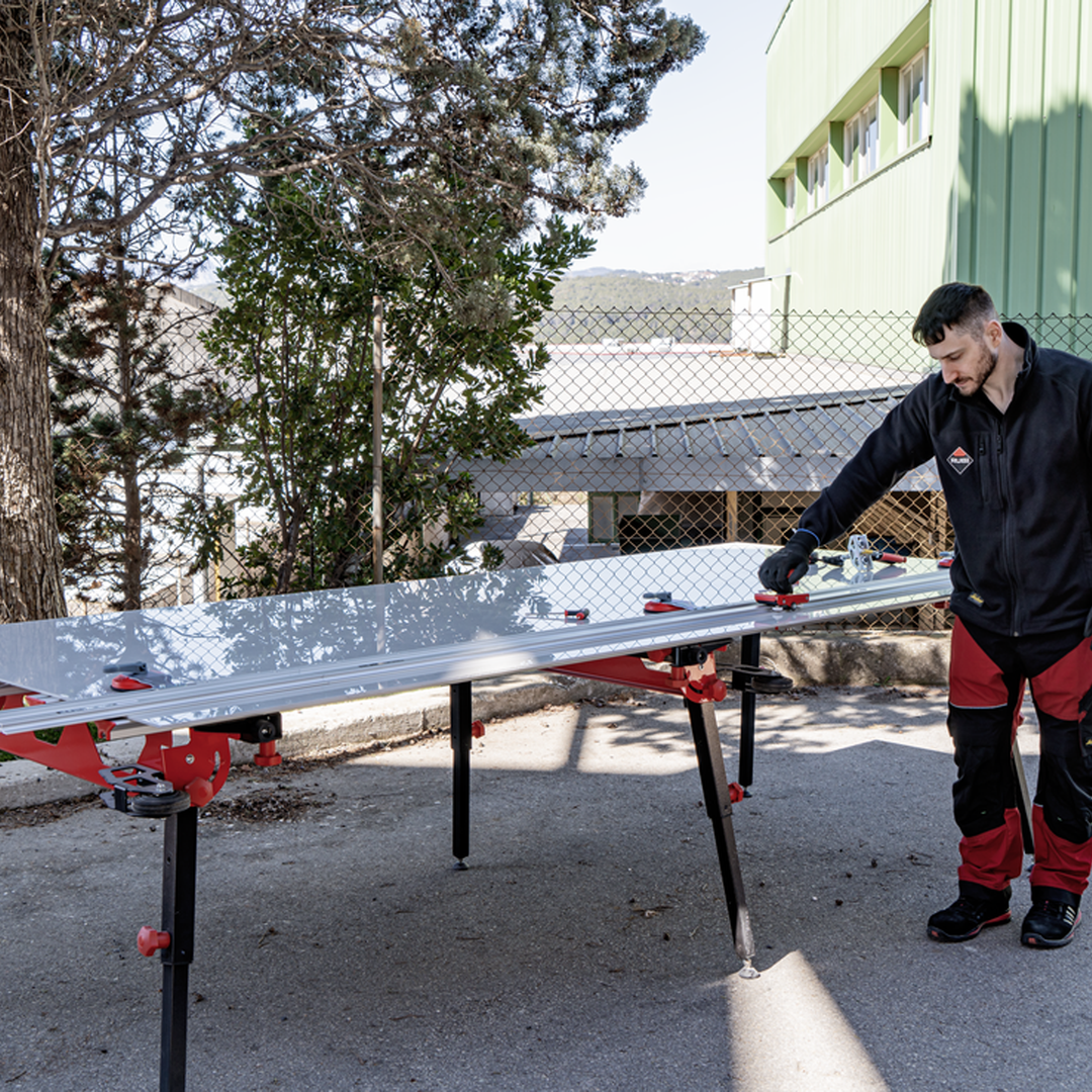 RUBI Slim Cutter G2 Manual Tile Cutter Being Used on RUBI Slab Table